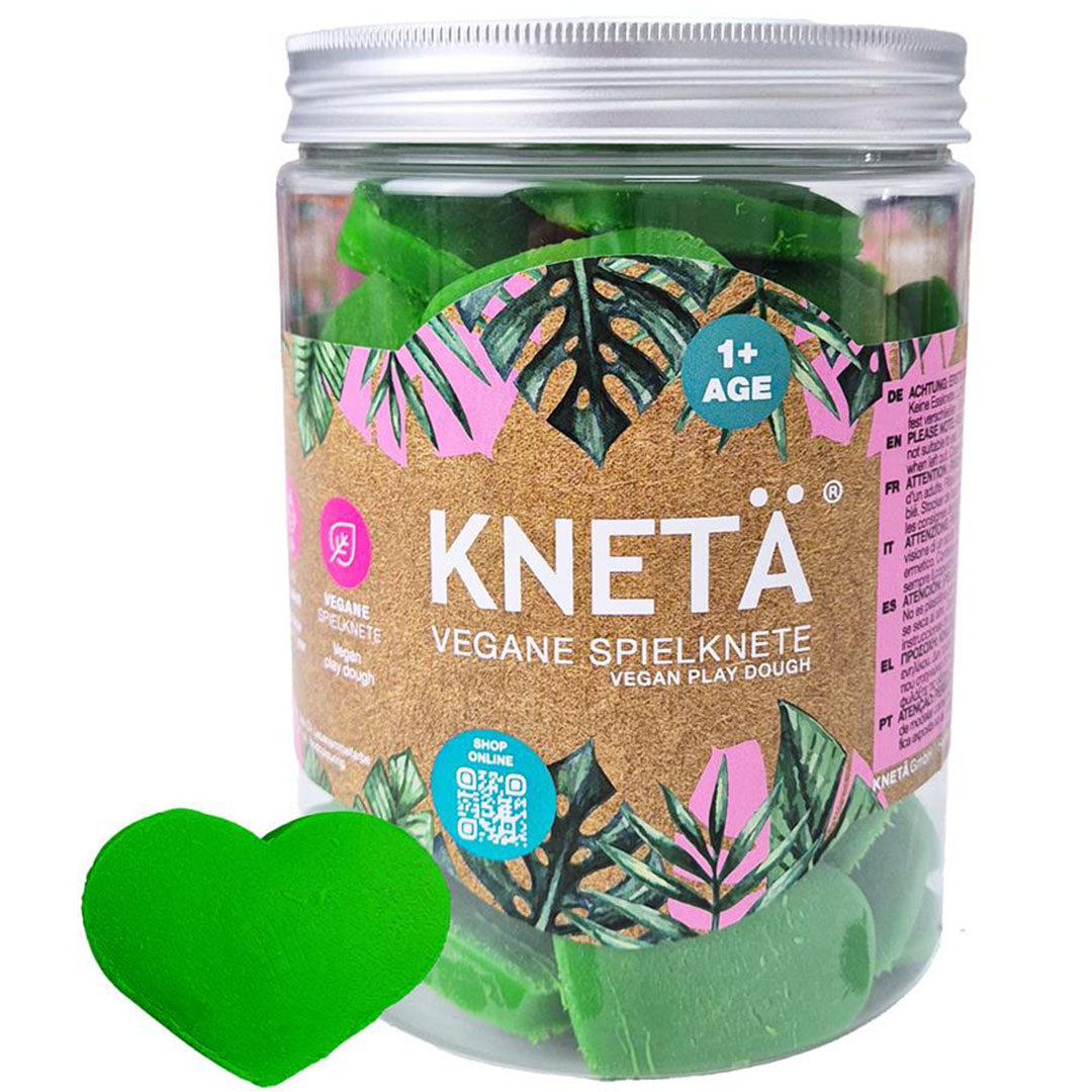 Knetä pot met groene hartjes speelklei voor kinderen vanaf 1 jaar, met één los hartje ervoor.