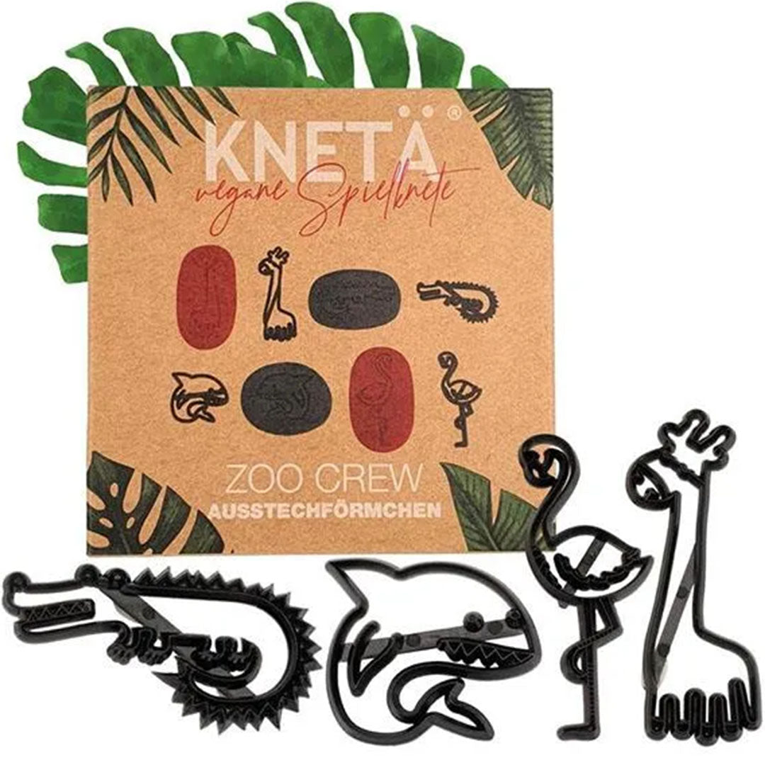 Knetä verpakking voor uitsteekvormen met vier zwarte dieren uitsteekvormen van een krokodil, haai, flamingo en giraf.