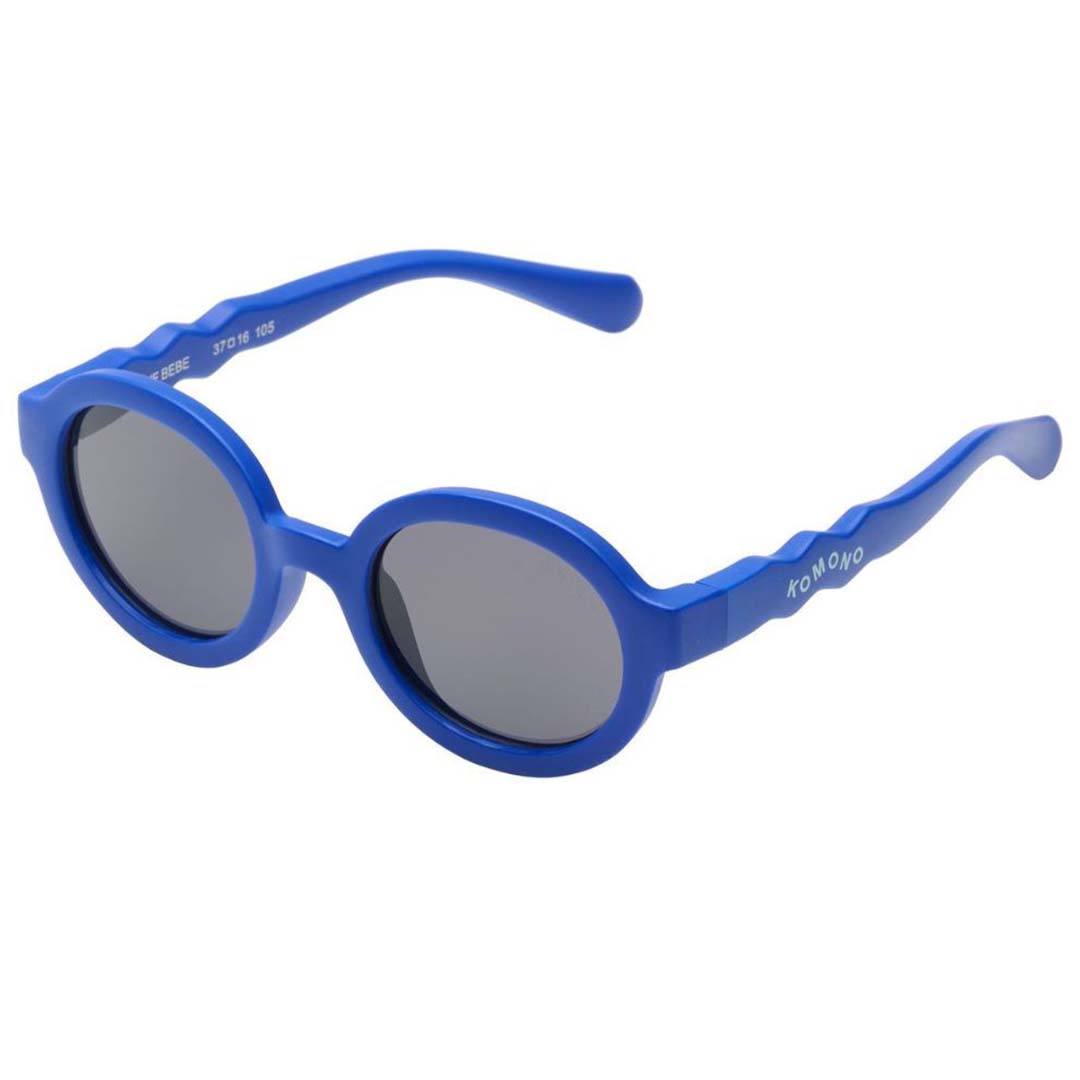 Komono babyzonnebril in berry blauw met donkere glazen.