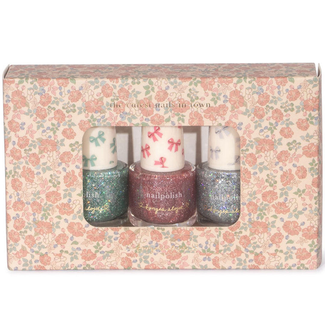 De verpakking van de Konges Sløjd peel-off nagellak set, een gebloemde doos met de drie glitter nagellakflesjes zichtbaar.