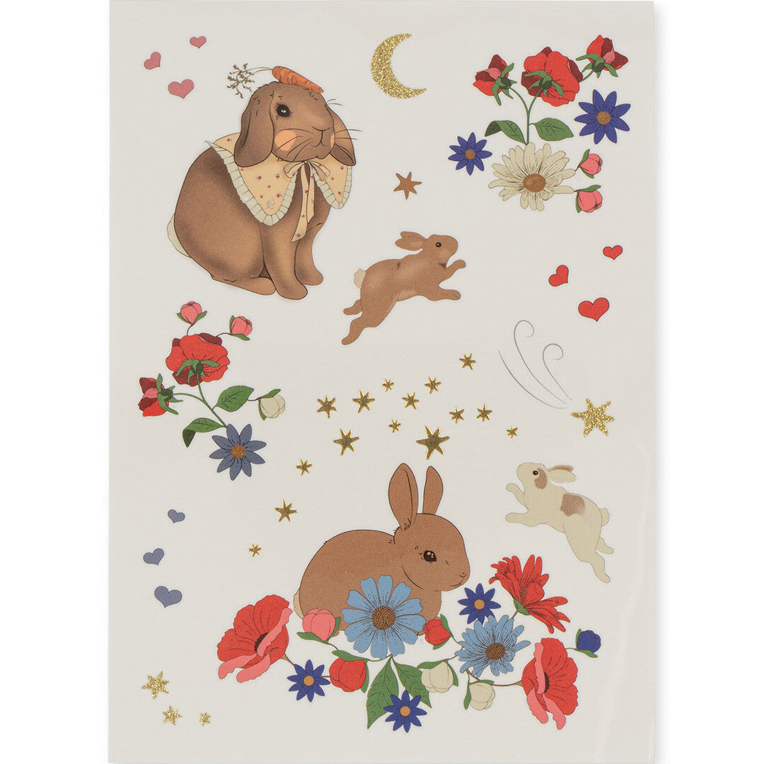 Vel met tijdelijke tatoeages van konijnen, bloemen, sterren en harten.