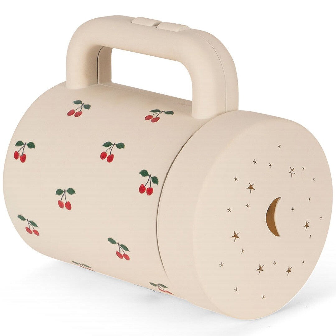 Konges Sløjd beige zaklamp met kersenpatroon en sterren- en maanuitsparingen.