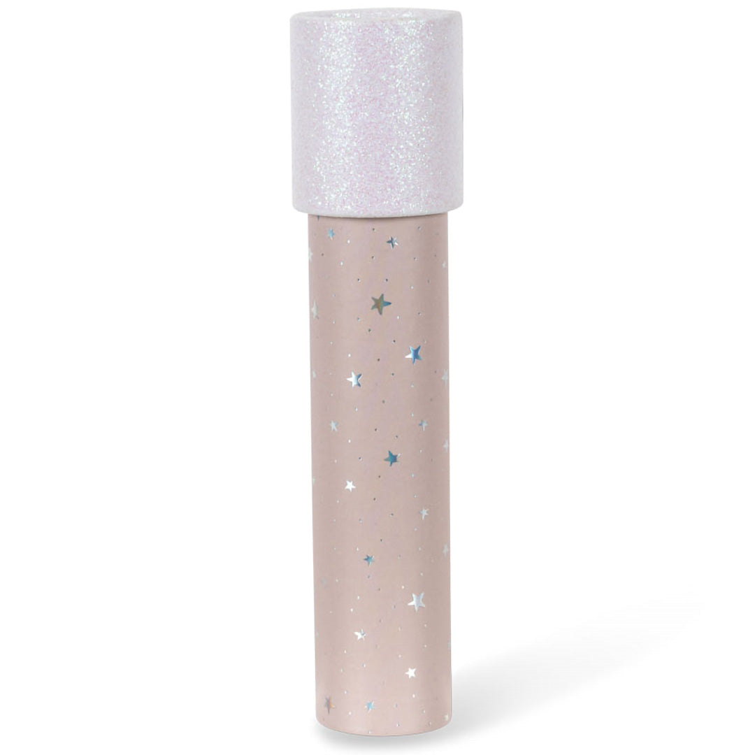 Konges Sløjd caleidoscoop met beige sterrenpatroon en glinsterende witte dop, rechtopstaand.