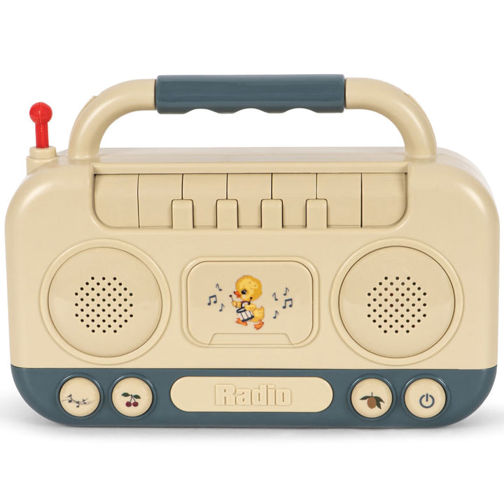 Konges Sløjd muziekspeelgoed in de vorm van een beige boombox met een eendje dat drumt.