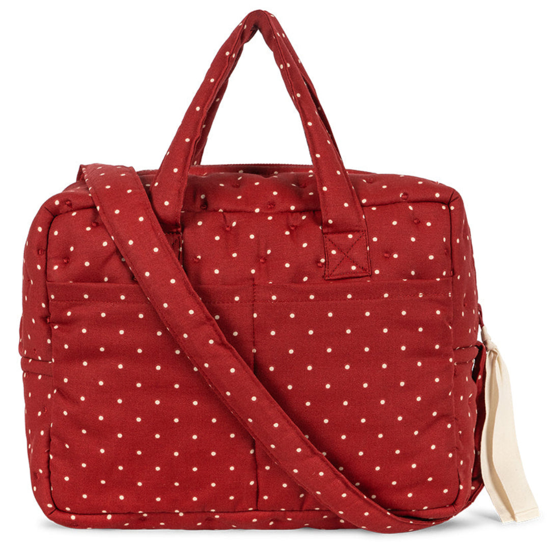Konges Sløjd poppenluiertas in rood met witte stippen.