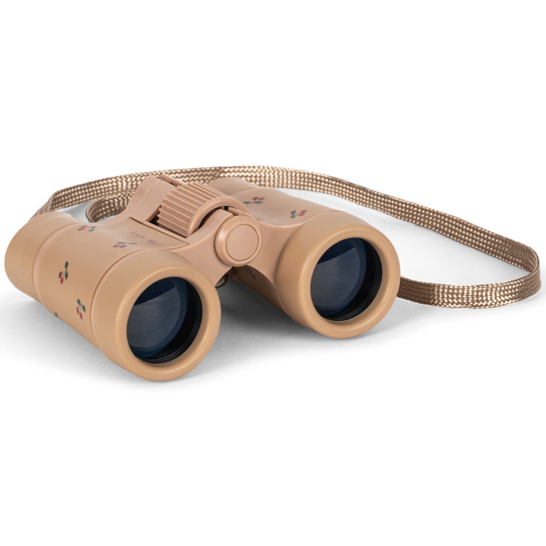 Konges Sløjd speelgoed verrekijker in beige met kersenpatroon en draagband.
