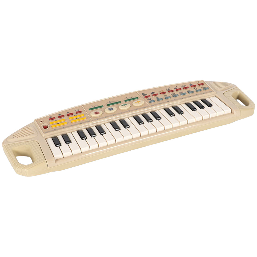 Konges Sløjd beige speelgoedkeyboard met handvatten, schuin van bovenaf gezien.