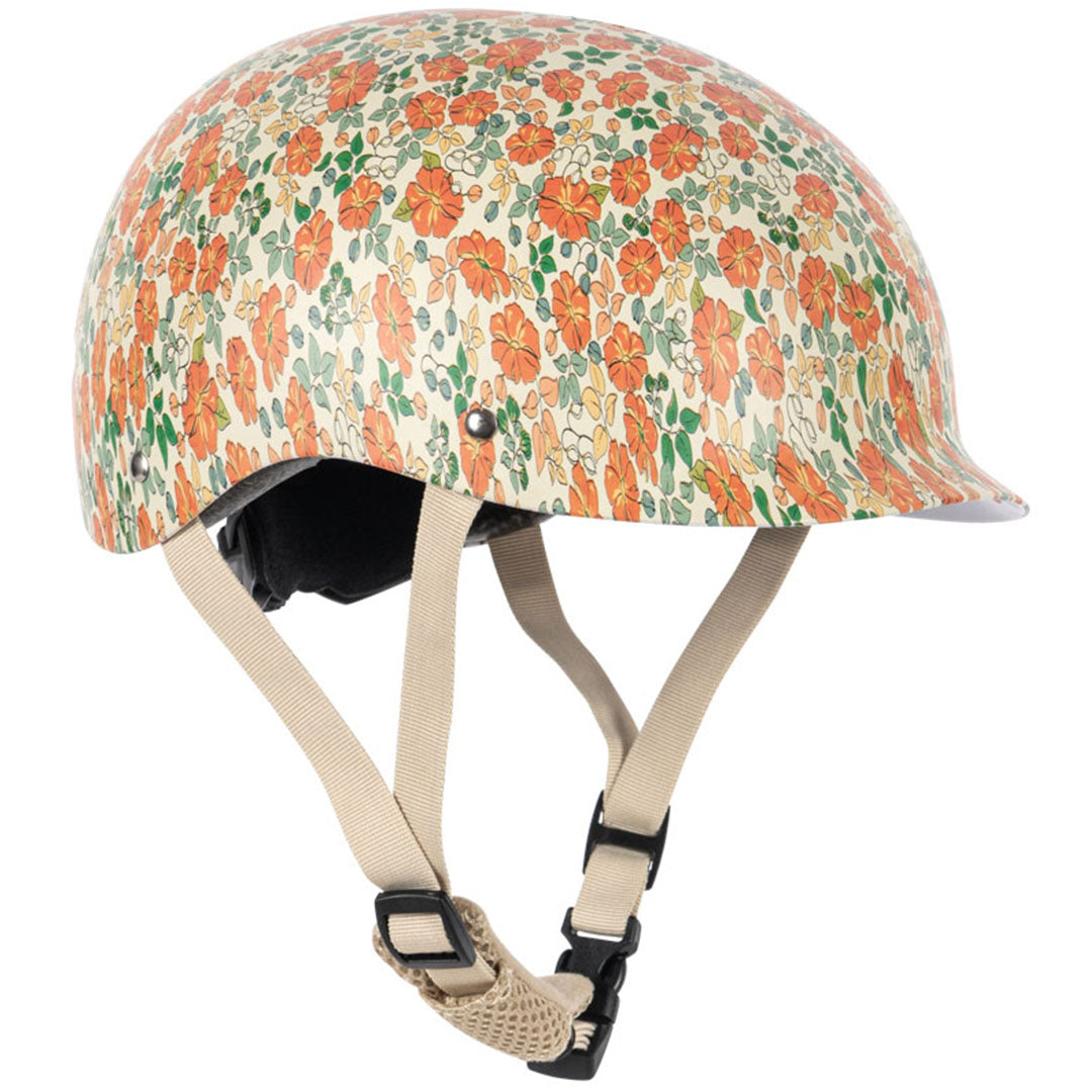 Konges Sløjd kinderhelm met beige ondergrond en oranje gebloemd patroon.
