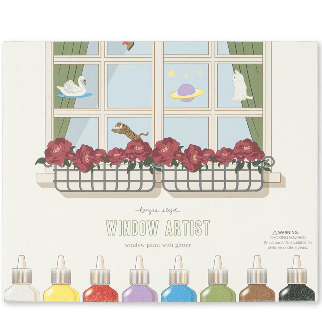 De verpakking van de Konges Sløjd raamverf hobbyset met een illustratie van een raam met bloemen en figuren.