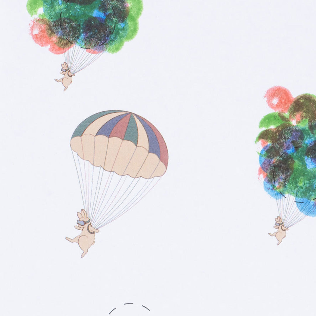Detail van een tekening met parachuterende konijntjes en kleurrijke stippenpatronen.