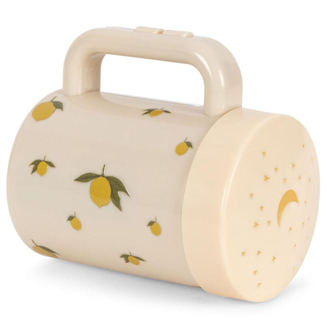 Konges Sløjd beige zaklamp met citroenpatroon en sterren en maan op de voorkant.