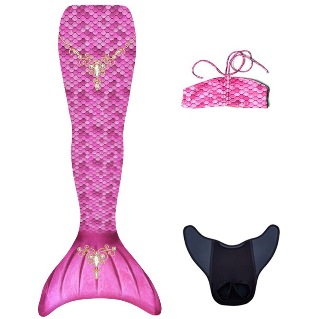 Kuaki Mermaids zeemeerminstaart set met roze schubbenpatroon, bijpassende bikinitop en zwarte monofin.