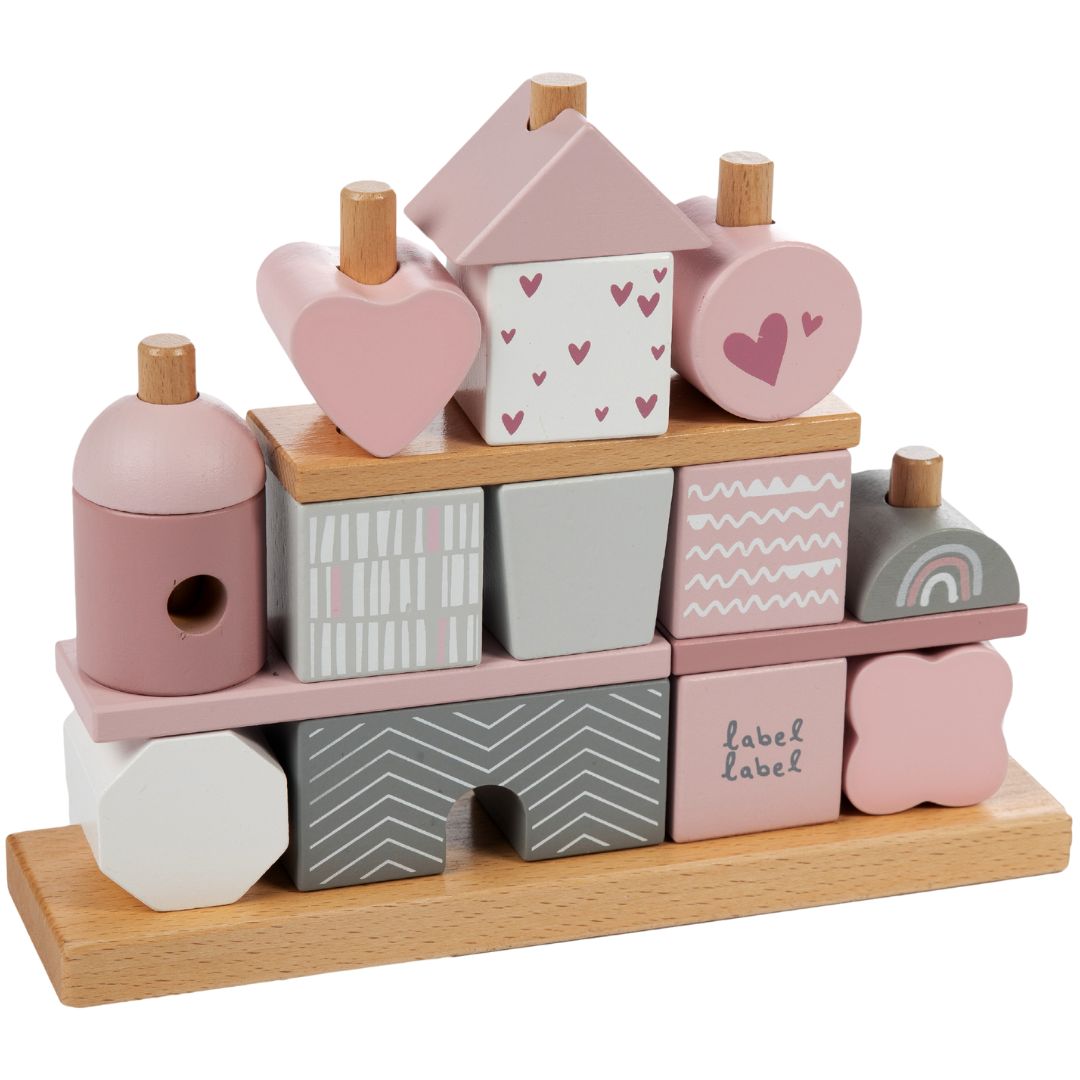 label label houten bouwblokken set in roze en grijs, opgestapeld tot een huis met diverse patronen.