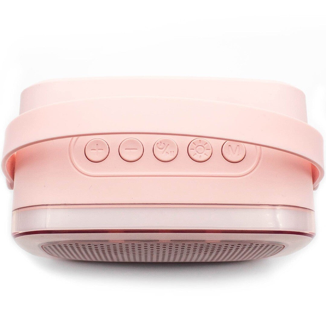 Bovenaanzicht van de roze karaokespeaker met bedieningsknoppen.