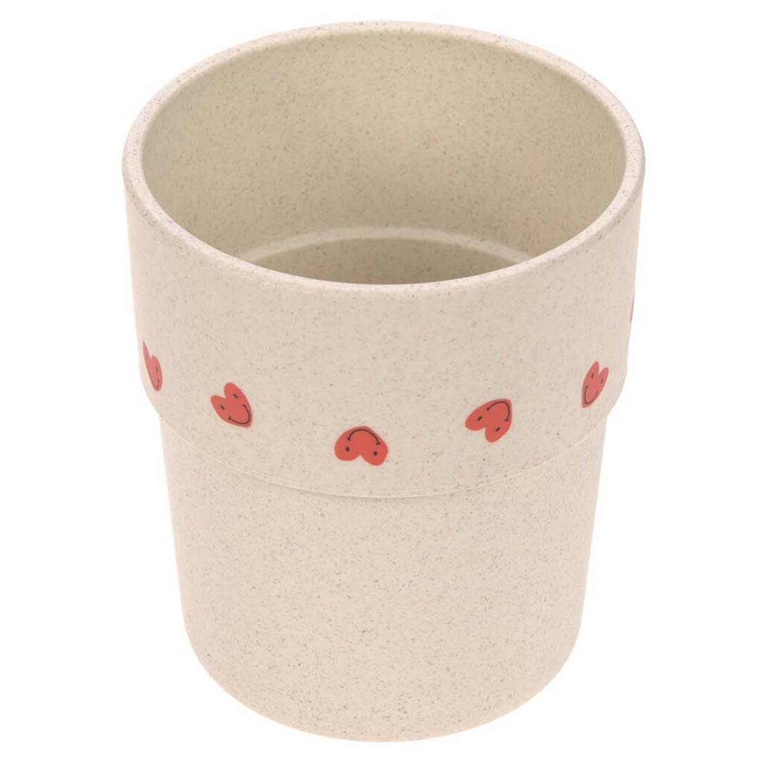 Lässig kindermok in beige met rode hartjes.