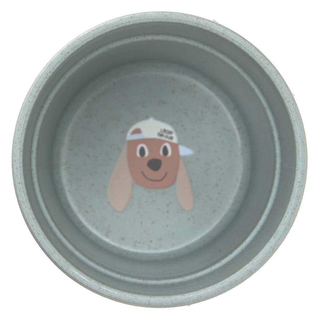 De binnenkant van de lässig kindermok met een afbeelding van een hondje.