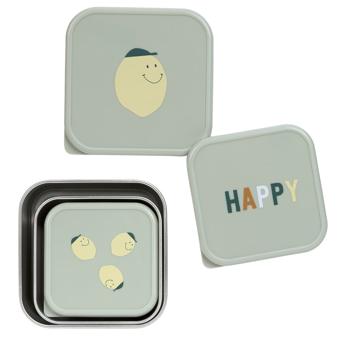 Drie lässig rvs snackdoosjes voor kinderen, waarvan één in een grotere past, met deksels met citroen- en 'HAPPY'-opdruk.