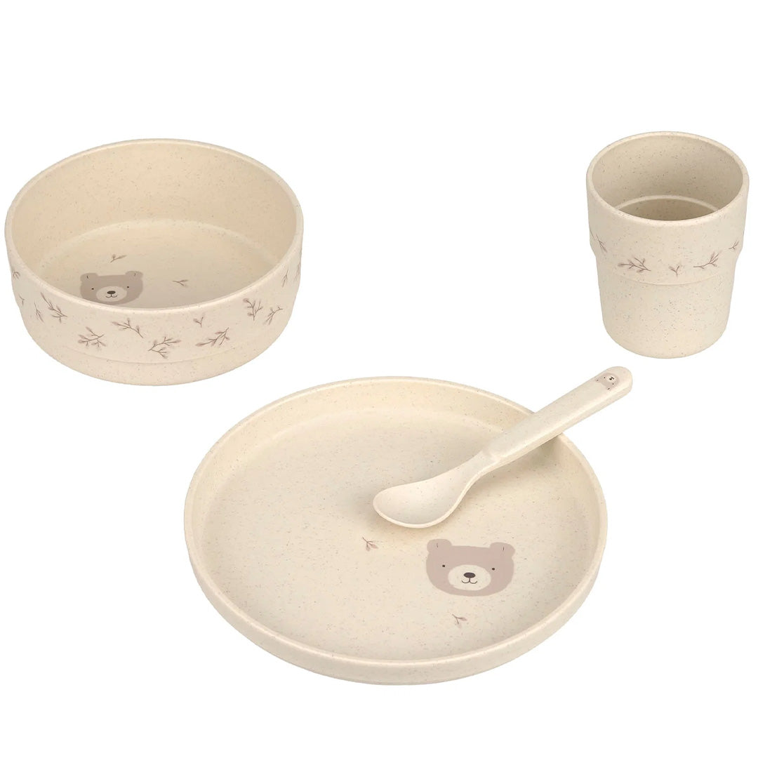 Lässig 4-delige beige babyserviesset met een bord, kom, beker en lepel, versierd met een beren- en bladerenpatroon.