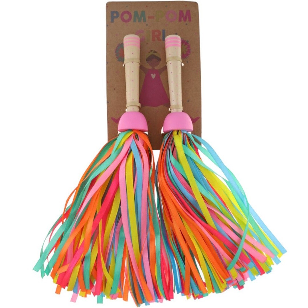 Twee le petit souk cheerleader pompoms met veelkleurige linten, gepresenteerd op hun kartonnen verpakking met de tekst 'POM-POM GIRL'.