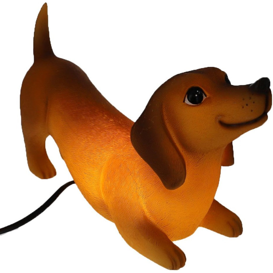 Le petit souk kinderlamp in de vorm van een bruine teckel, verlicht.