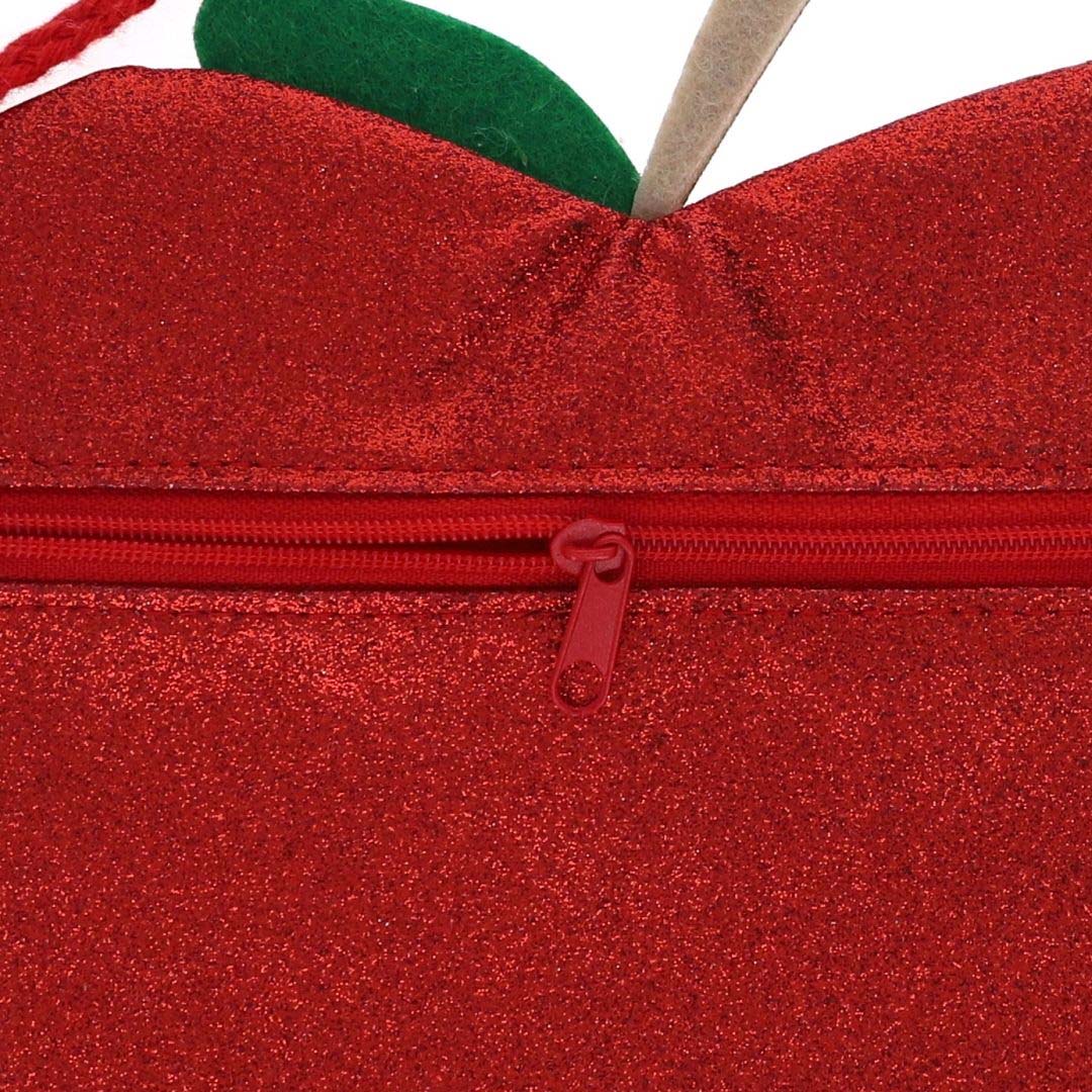 Detail van de rode rits op de achterkant van de rode glitter kinder schoudertas.
