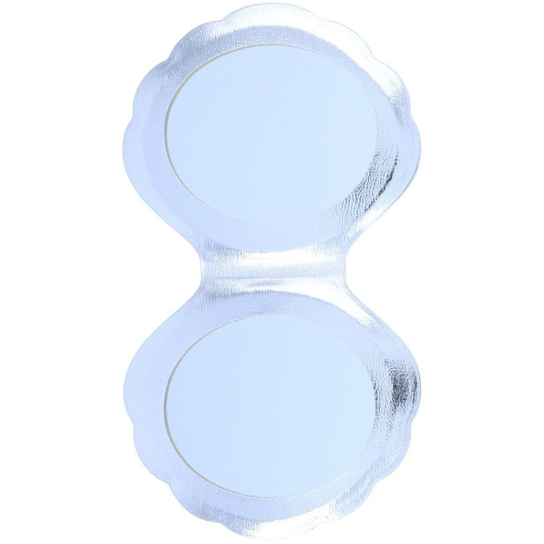 Achterkant van de le petit souk schelpvormige compact spiegel met textuur.