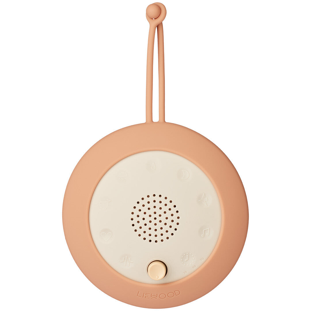 Liewood baby speaker in tuscany rose mix met speaker, bedieningsknop en diverse symbolen aan de voorkant.