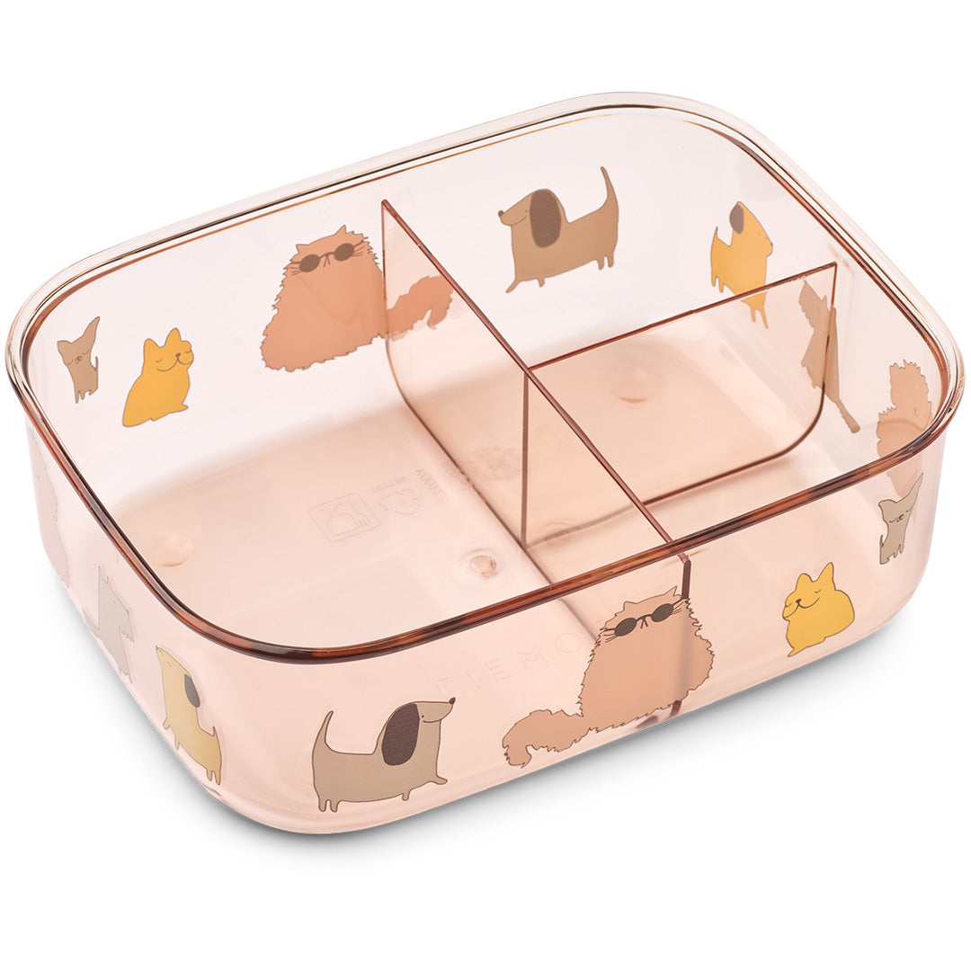 De transparante onderkant van de Liewood broodtrommel met twee verdelers en illustraties van katten en honden.