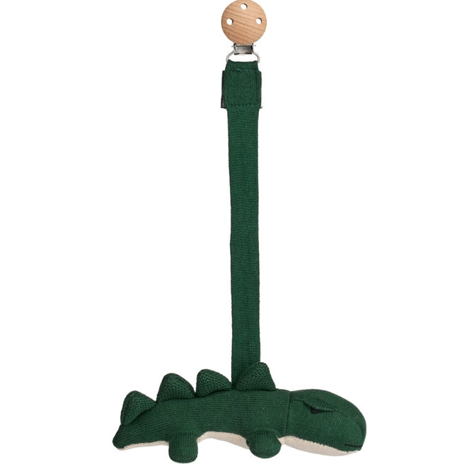 Liewood babyspeelgoed fopspeenclip met een groene gebreide krokodil en houten clip.