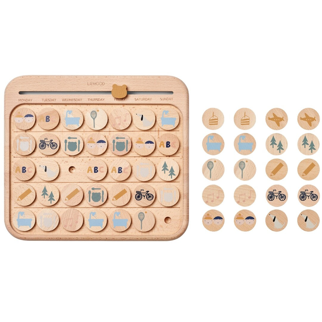Liewood houten educatieve weekkalender met losse houten schijfjes met symbolen.