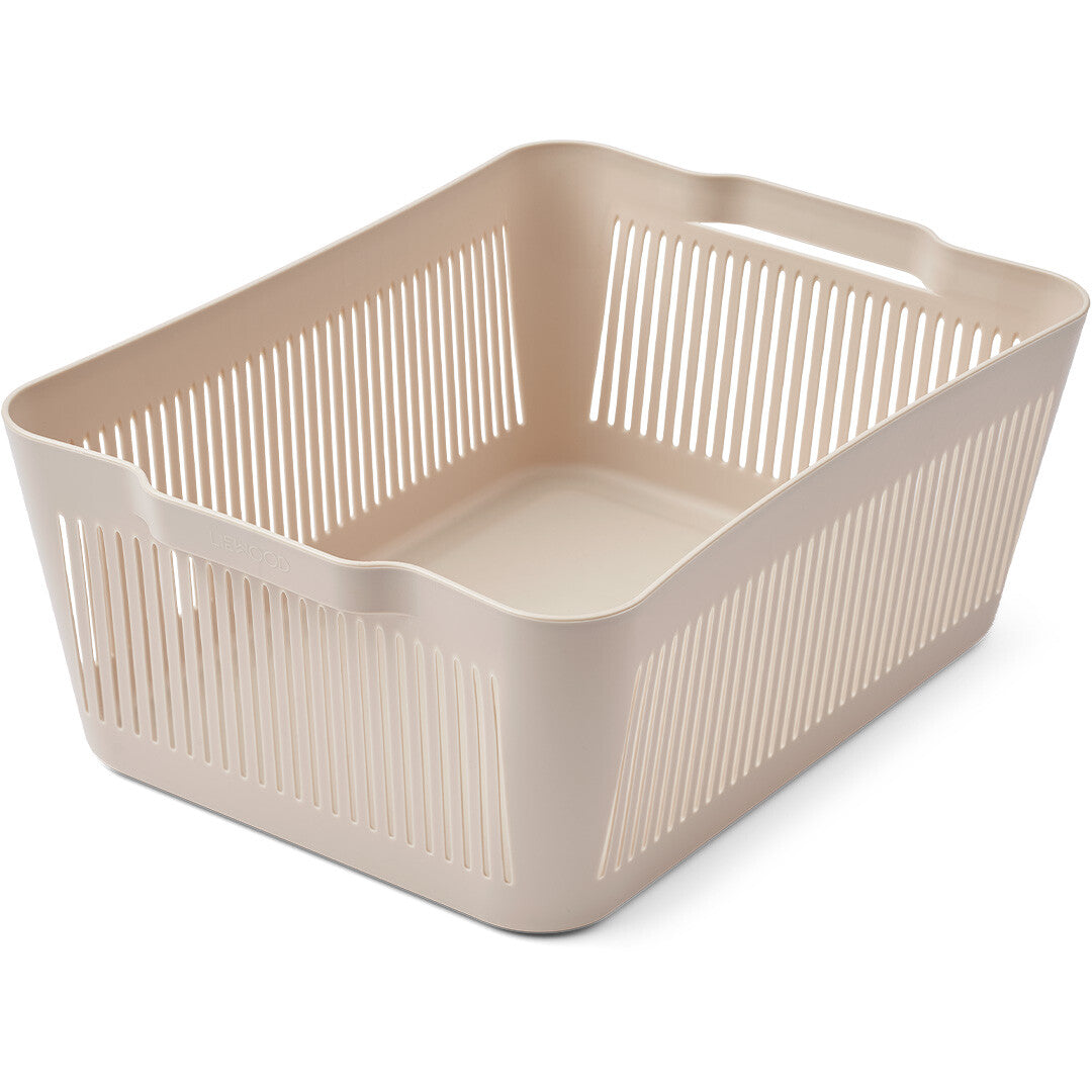 Een beige Liewood opbergbak met gestreepte zijkanten, schuin gefotografeerd.