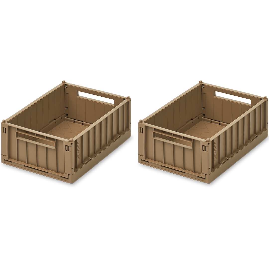 Twee open Liewood Weston opbergkratten in beige kleur, schuin van bovenaf gefotografeerd.