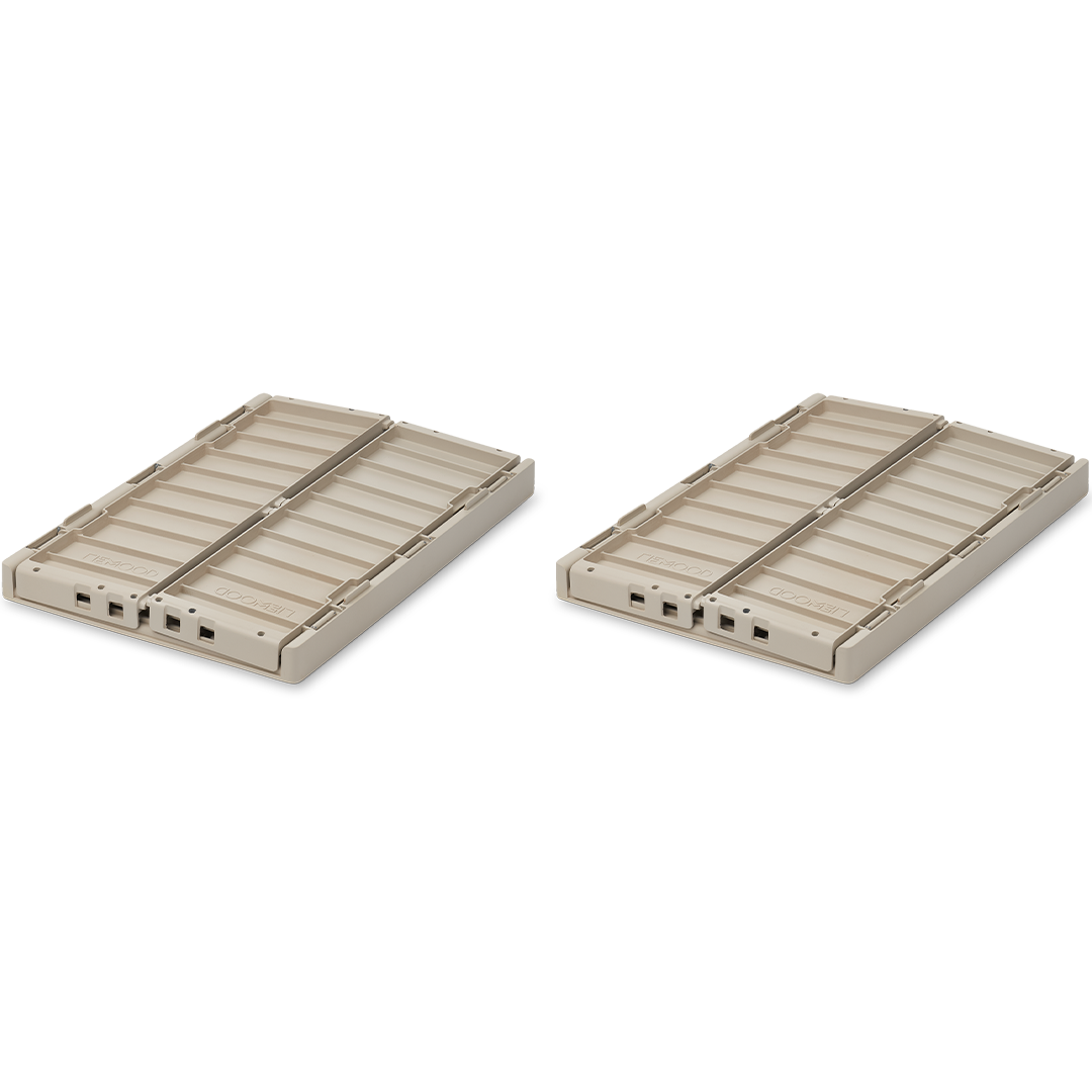 Twee beige Liewood opbergkratten van 10 liter, plat opgevouwen.