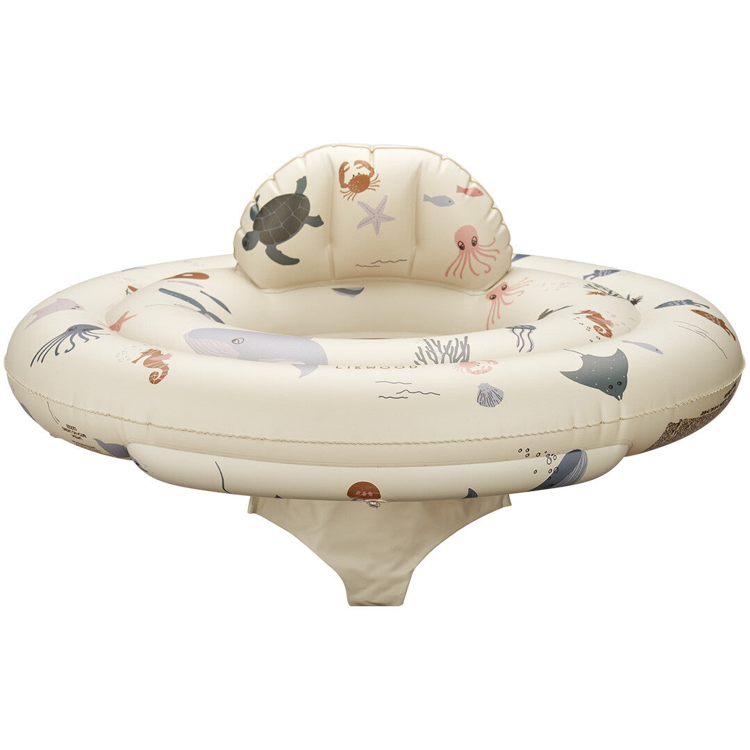Liewood zwemstoel voor dreumesen met een beige 'sea creature' patroon.