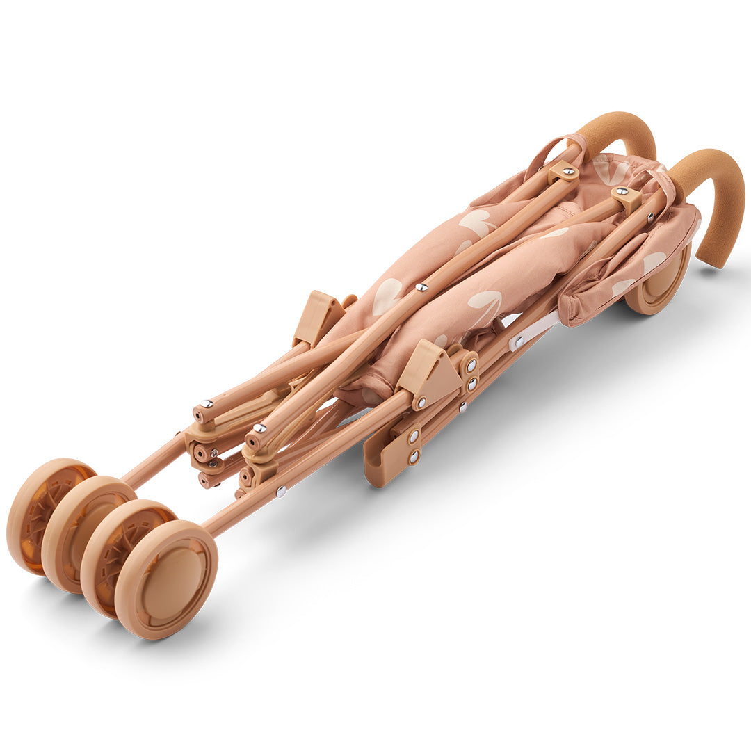 De Liewood poppenbuggy Elsie met hartenpatroon, opgevouwen.