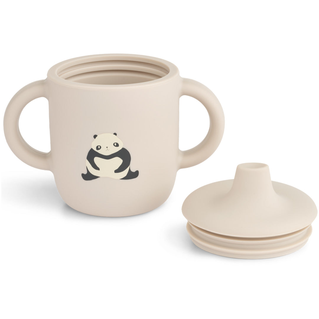 Liewood siliconen tuitbeker in beige met panda-illustratie, met het deksel ernaast.