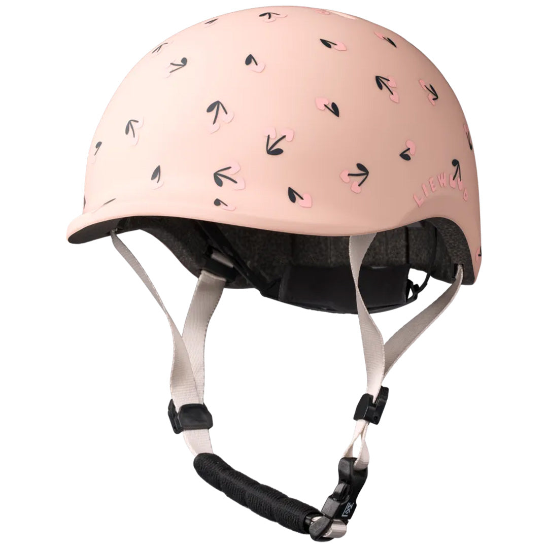 Liewood roze kinderhelm met kersenpatroon.