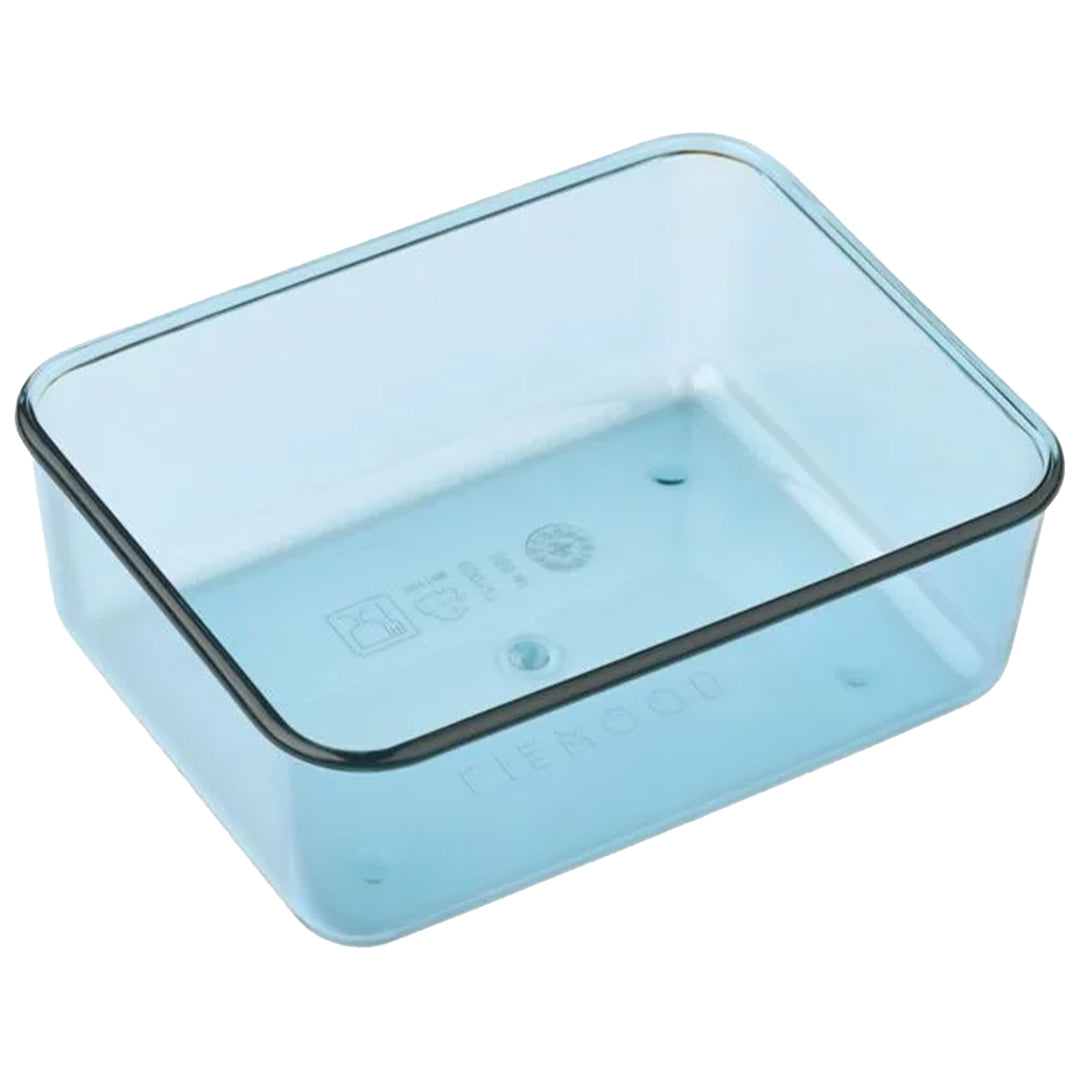 Lichtblauwe, transparante plastic onderkant van een Liewood snackdoosje.