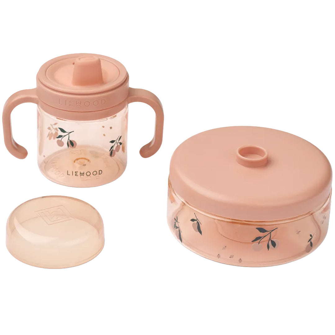 Liewood snackdoosje en drinkbeker set in roze met bloemenpatroon.