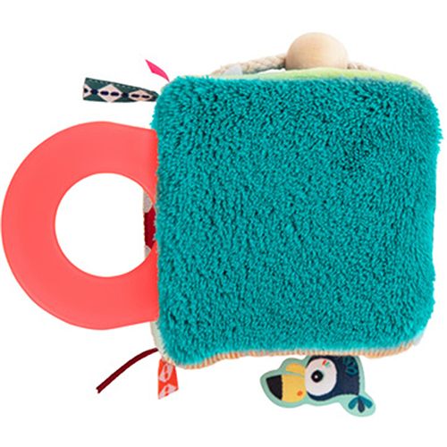 Lilliputiens activiteitenkubus met een zacht, pluizig blauwgroen vlak en een grote rode siliconen ring.
