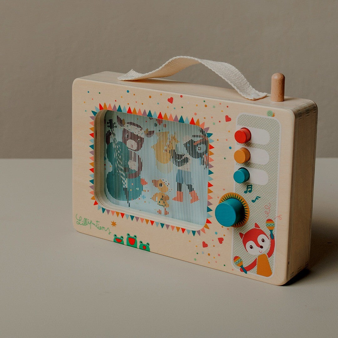 Lilliputiens houten muziekdoos met geanimeerde dierenfiguren, schuin gefotografeerd op een lichte ondergrond.