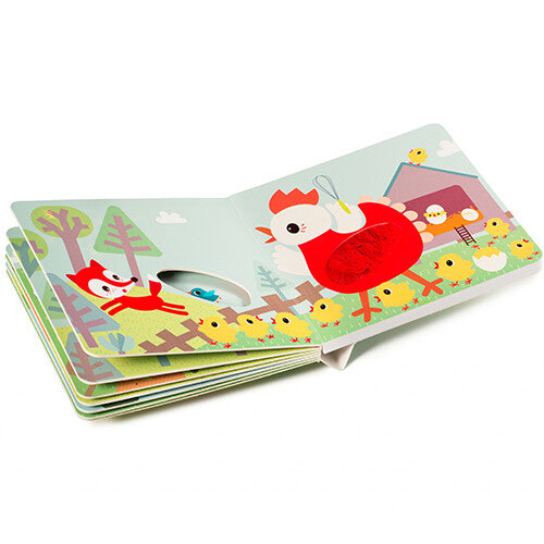 Een open Lilliputiens voelboek met geluiden toont een vos en een kip met kuikens en een voelbare textuur.
