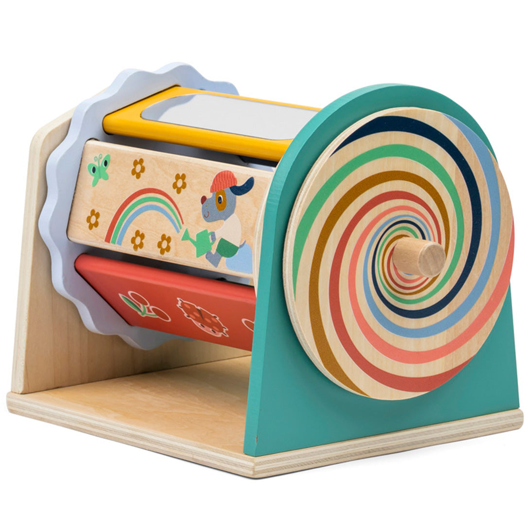 Lilliputiens houten activiteiten- kleurenroller met kleurrijke spiralen en draaibare blokken met figuren en een spiegel.