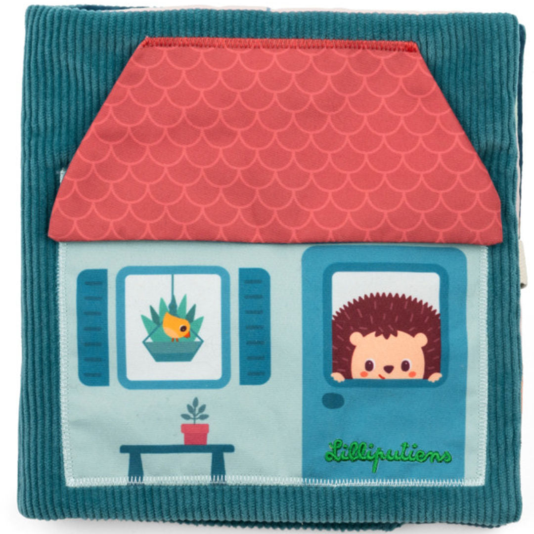 Lilliputiens activiteitenboek met een egel die uit een raam van een huis kijkt.