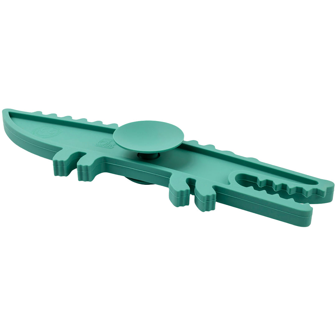 Lilliputiens badspeeltje balans krokodil van de zijkant, met een pop-it element in het midden.