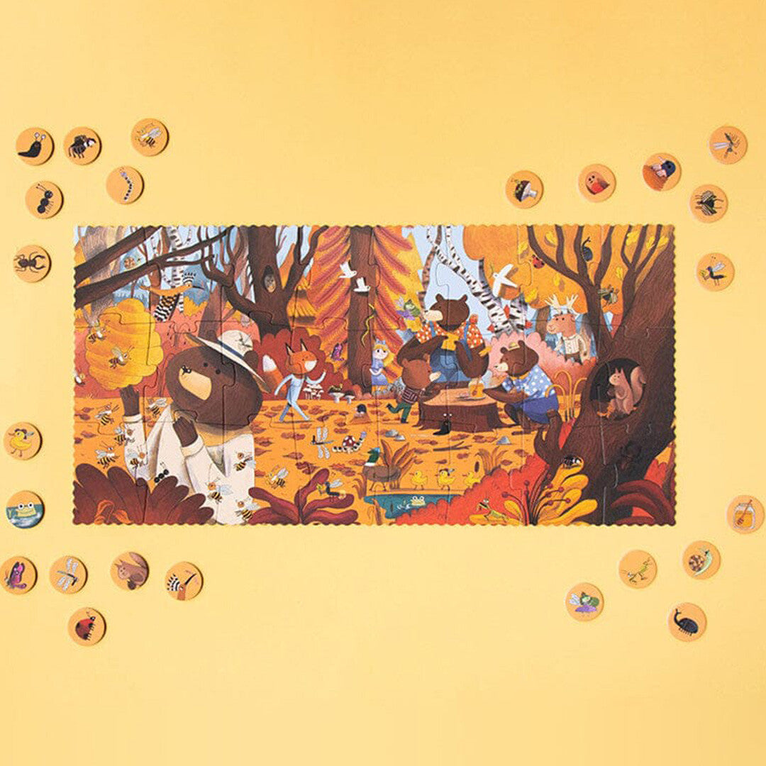 De complete Londji Bear's Forest kinderpuzzel met bosdieren en omringende zoekfiches.
