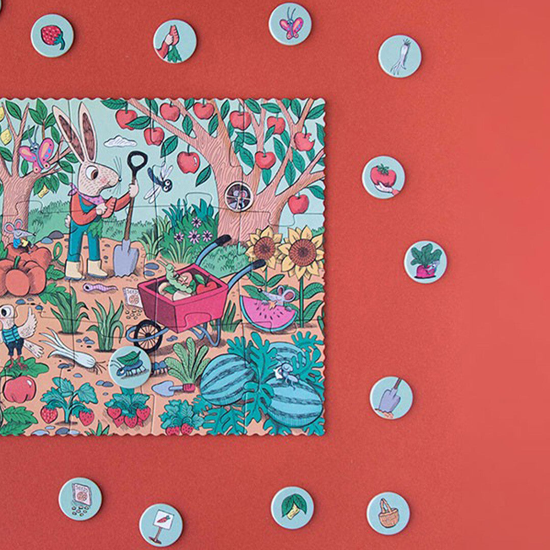 Een gedeeltelijk gelegde Rabbit's Garden puzzel met konijnen die tuinieren, omringd door ronde zoekspel-tokens.