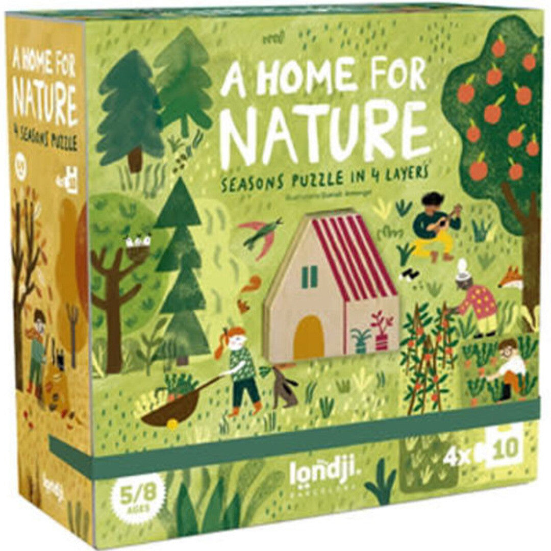De verpakking van de Londji 'A Home for Nature' seizoenen legpuzzel met illustraties van een huis en natuur.