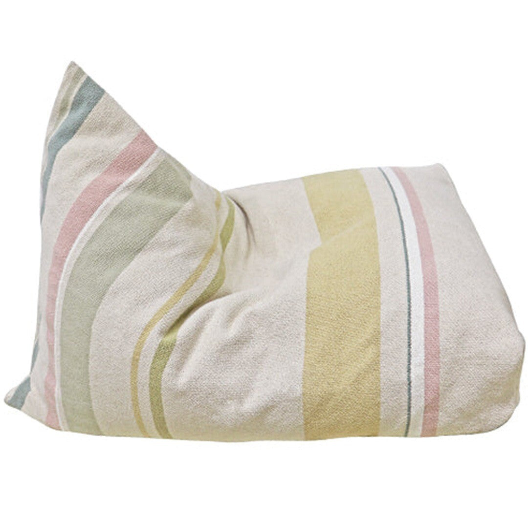 Lorena Canals poef Cleo met beige en meerkleurige strepen op een witte achtergrond.
