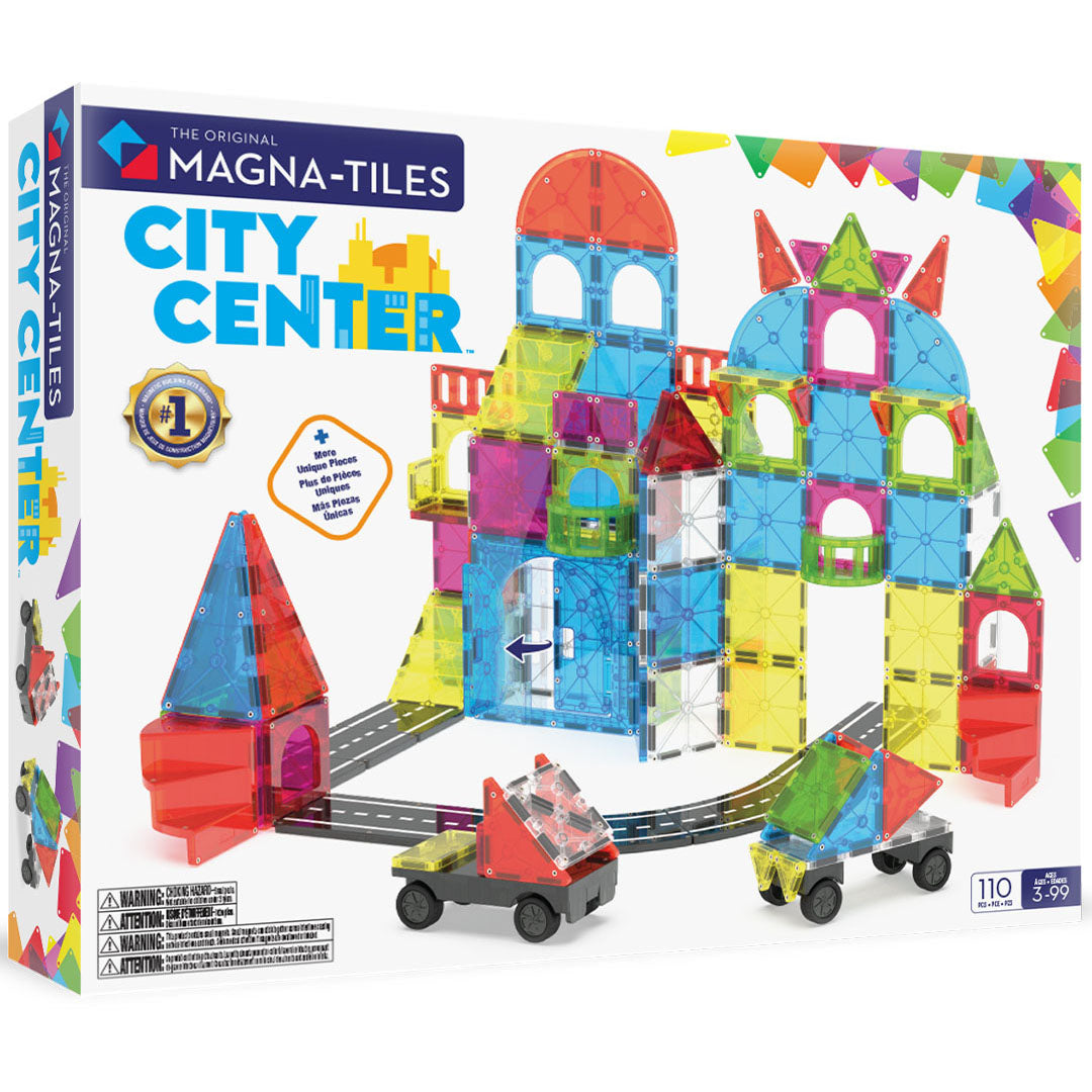 Verpakking van de Magna-Tiles City Center bouwset met een kleurrijk gebouw en twee voertuigen van magnetische tegels.